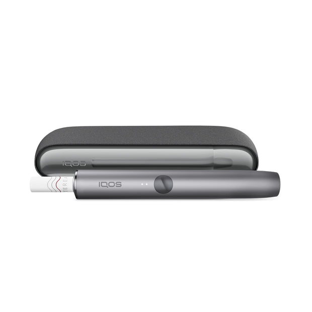 IQOS ILUMA Kit Pebble Grey – moderner Tabakerhitzer in Grau, liegend