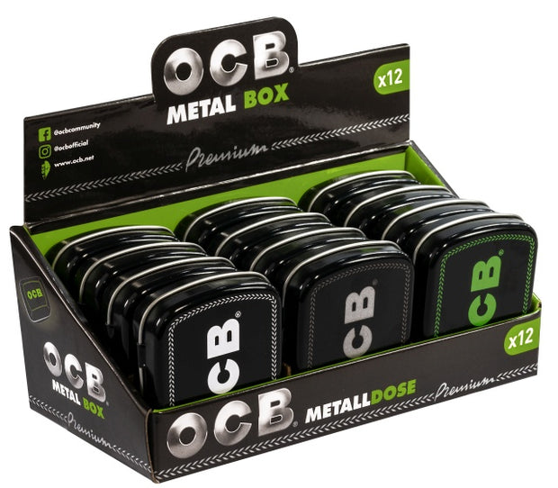 OCB Metall Box 12er Karton, schwarze Dosen mit weißem, silbernem und grünem OCB Logo, Aufbewahrungsdose Vorratspack